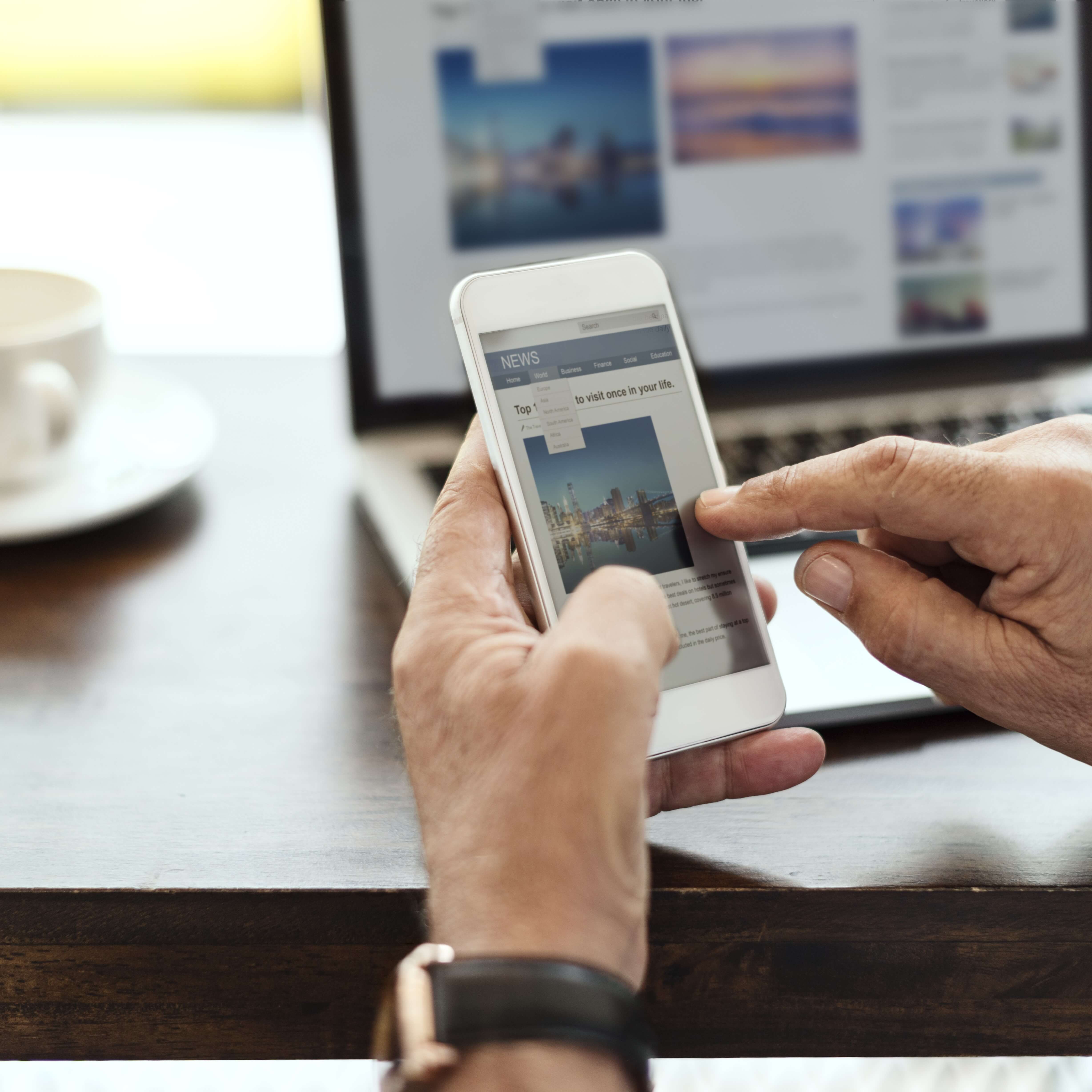 elderly-man-is-using-mobile-phone (1)
